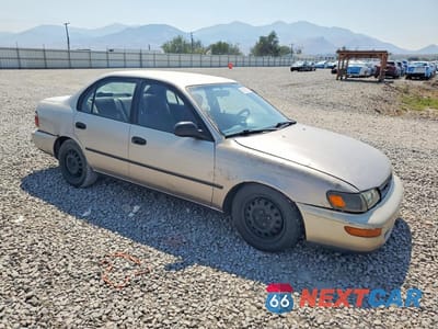 Czwarte zdjęcie samochodu z boku: 1994 TOYOTA COROLLA DX VIN:1NXAE09B6RZ204099 - miniatura