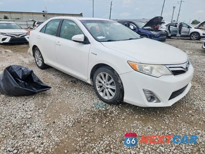 Czwarte zdjęcie samochodu z boku: 2012 TOYOTA CAMRY HYBRID XLE VIN:4T1BD1FK0CU023475 - miniatura