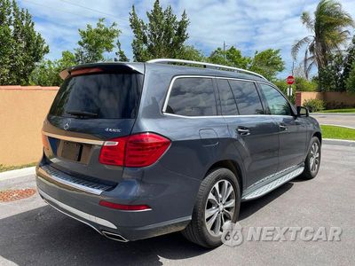 Czwarte zdjęcie samochodu z boku: 2015 MERCEDES-BENZ GL 450 4MATIC VIN:4JGDF6EE5FA598124 - miniatura