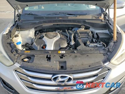 Zdjęcie 12 z 13 samochodu: 2014 HYUNDAI SANTA FE SPORT 2.0T VIN:5XYZW3LA6EG156606 - miniatura
