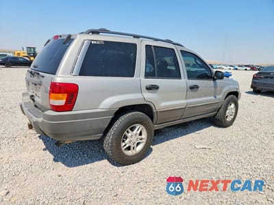 Trzecie zdjęcie samochodu z tyłu: 2002 JEEP GRAND CHEROKEE LAREDO VIN:1J4GW48N12C183036 - miniatura