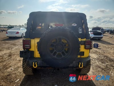 Zdjęcie 6 z 12 samochodu: 2011 JEEP WRANGLER SPORT VIN:1J4AA2D12BL537741 - miniatura