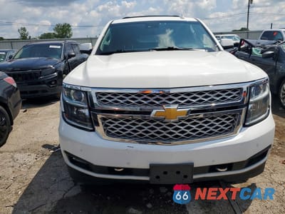 Piąte zdjęcie samochodu w środku: 2016 CHEVROLET SUBURBAN K1500 LT VIN:1GNSKHKC4GR442589 - miniatura
