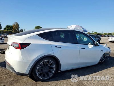 Trzecie zdjęcie samochodu z tyłu: 2021 TESLA MODEL Y VIN:5YJYGDEE8MF157115 - miniatura