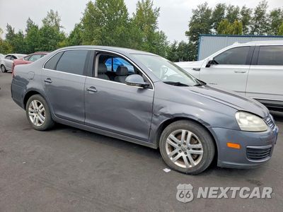 Czwarte zdjęcie samochodu z boku: 2005 VOLKSWAGEN NEW JETTA TDI OPTION PACKAGE 2 VIN:3VWDT71KX5M636265 - miniatura