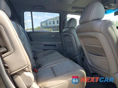 Zdjęcie 11 z 13 samochodu: 2011 HONDA PILOT EXL VIN:5FNYF4H63BB105878 - miniatura