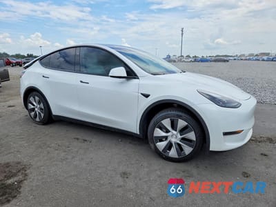 Czwarte zdjęcie samochodu z boku: 2023 TESLA MODEL Y VIN:7SAYGDED1PF958399 - miniatura