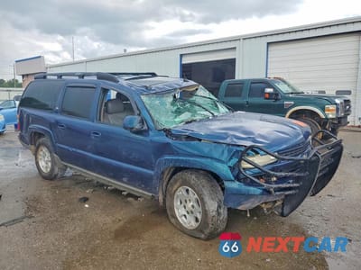 Czwarte zdjęcie samochodu z boku: 2005 CHEVROLET SUBURBAN K1500 VIN:3GNFK16ZX5G177925 - miniatura