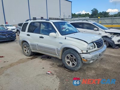 Czwarte zdjęcie samochodu z boku: 2003 SUZUKI GRAND VITARA JLX LIMITED VIN:JS3TD62V034104161 - miniatura