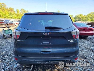 Zdjęcie 6 z 13 samochodu: 2017 FORD ESCAPE TITANIUM VIN:1FMCU9J95HUD47441 - miniatura