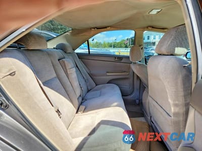 Zdjęcie 10 z 12 samochodu: 2003 TOYOTA CAMRY LE VIN:4T1BE32K03U733930 - miniatura