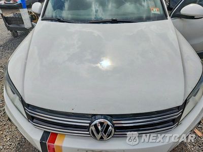 Zdjęcie 12 z 13 samochodu: 2013 VOLKSWAGEN TIGUAN S VIN:WVGBV7AX8DW545165 - miniatura