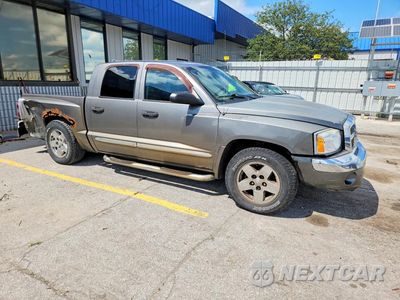 Czwarte zdjęcie samochodu z boku: 2005 DODGE DAKOTA QUAD LARAMIE VIN:1D7HW58N85S204660 - miniatura