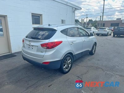 Czwarte zdjęcie samochodu z boku: 2014 HYUNDAI TUCSON SE VIN:KM8JUCAG7EU796599 - miniatura