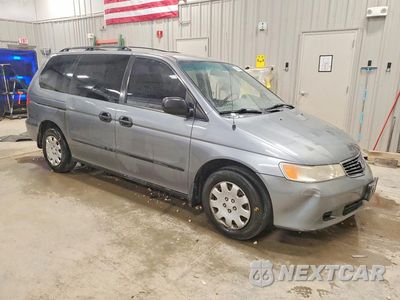 Czwarte zdjęcie samochodu z boku: 1999 HONDA ODYSSEY LX VIN:2HKRL1851XH550096 - miniatura