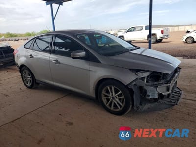 Czwarte zdjęcie samochodu z boku: 2016 FORD FOCUS SEL VIN:1FADP3F27GL254407 - miniatura