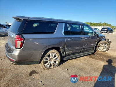 Trzecie zdjęcie samochodu z tyłu: 2021 CHEVROLET SUBURBAN K1500 HIGH COUNTRY VIN:1GNSKGKL4MR404737 - miniatura
