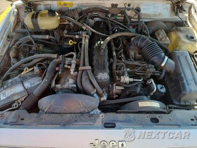 Zdjęcie 12 z 13 samochodu: 1990 JEEP CHEROKEE LAREDO VIN:1J4FJ58L4LL167588 - miniatura