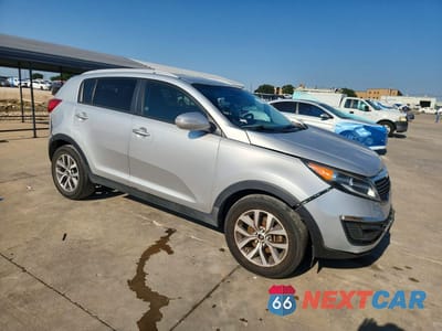 Czwarte zdjęcie samochodu z boku: 2014 KIA SPORTAGE LX VIN:KNDPB3AC5E7563000 - miniatura