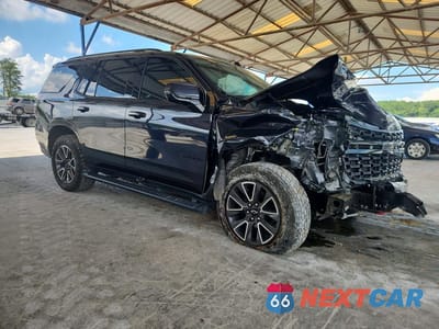 Czwarte zdjęcie samochodu z boku: 2023 CHEVROLET TAHOE K1500 Z71 VIN:1GNSKPKD9PR191006 - miniatura