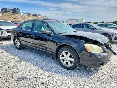 Czwarte zdjęcie samochodu z boku: 2003 NISSAN ALTIMA 2.5 VIN:1N4AL11D53C282180 - miniatura