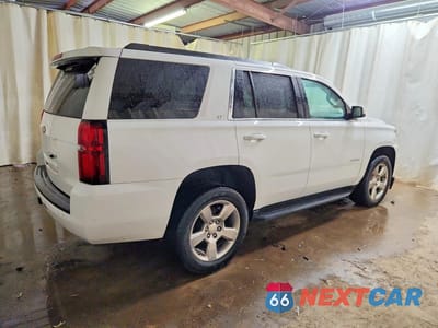 Trzecie zdjęcie samochodu z tyłu: 2017 CHEVROLET TAHOE C1500 LT VIN:1GNSCBKC5HR328970 - miniatura