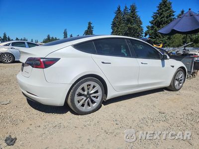 Trzecie zdjęcie samochodu z tyłu: 2021 TESLA MODEL 3 VIN:5YJ3E1EB0MF868988 - miniatura