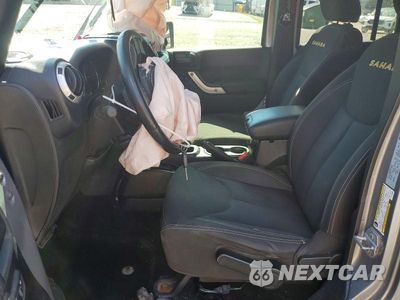 Zdjęcie 7 z 13 samochodu: 2015 JEEP WRANGLER UNLIMITED SAHARA VIN:1C4BJWEG8FL722340 - miniatura