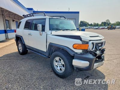 Czwarte zdjęcie samochodu z boku: 2011 TOYOTA FJ CRUISER BASE VIN:JTEBU4BF5BK108249 - miniatura