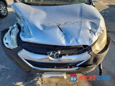 Zdjęcie 12 z 13 samochodu: 2011 HYUNDAI TUCSON LIMITED VIN:KM8JU3AC4BU138151 - miniatura