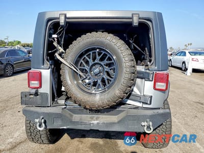 Zdjęcie 6 z 12 samochodu: 2014 JEEP WRANGLER UNLIMITED SPORT VIN:1C4HJWDG1EL237368 - miniatura
