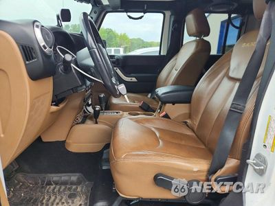 Zdjęcie 7 z 14 samochodu: 2014 JEEP WRANGLER UNLIMITED SAHARA VIN:1C4HJWEG7EL128024 - miniatura