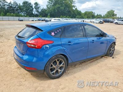 Trzecie zdjęcie samochodu z tyłu: 2017 FORD FOCUS SE VIN:1FADP3K29HL231475 - miniatura