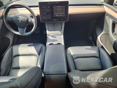 Zdjęcie 8 z 13 samochodu: 2024 TESLA MODEL Y VIN:7SAYGDEE5RF991935 - miniatura