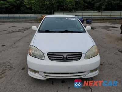 Piąte zdjęcie samochodu w środku: 2004 TOYOTA COROLLA S VIN:1NXBR32E24Z223501 - miniatura