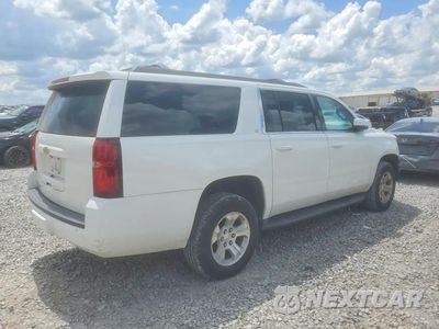 Trzecie zdjęcie samochodu z tyłu: 2018 CHEVROLET SUBURBAN C1500 LT VIN:1GNSCHKC5JR101402 - miniatura