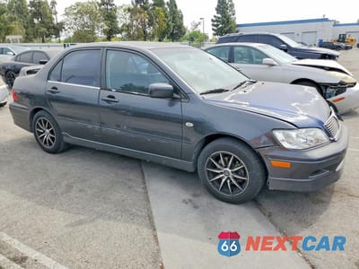 Czwarte zdjęcie samochodu z boku: 2003 MITSUBISHI LANCER OZ RALLY VIN:JA3AJ86E93U121673 - miniatura