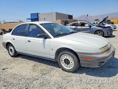 Czwarte zdjęcie samochodu z boku: 1996 SATURN SL1 VIN:1G8ZH5284TZ357899 - miniatura