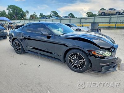 Czwarte zdjęcie samochodu z boku: 2022 FORD MUSTANG VIN:1FA6P8TH5N5147517 - miniatura