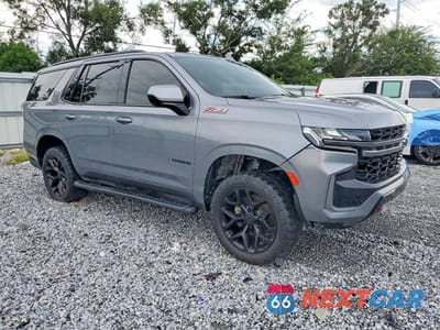 Czwarte zdjęcie samochodu z boku: 2021 CHEVROLET TAHOE K1500 Z71 VIN:1GNSKPKD6MR466357 - miniatura