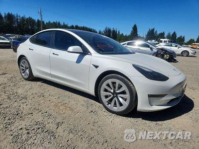 Czwarte zdjęcie samochodu z boku: 2021 TESLA MODEL 3 VIN:5YJ3E1EB0MF868988 - miniatura