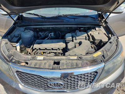 Zdjęcie 12 z 13 samochodu: 2013 KIA SORENTO LX VIN:5XYKT3A1XDG315297 - miniatura