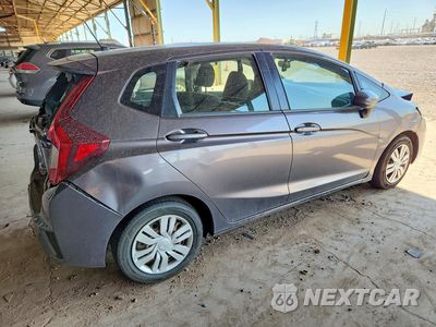 Trzecie zdjęcie samochodu z tyłu: 2016 HONDA FIT LX VIN:JHMGK5H54GS010369 - miniatura