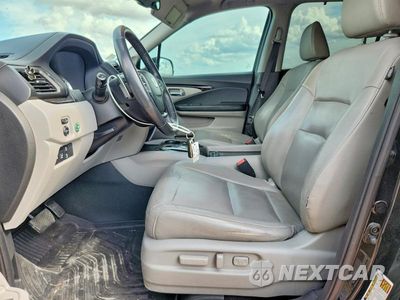 Zdjęcie 7 z 13 samochodu: 2016 HONDA PILOT TOURING VIN:5FNYF5H98GB027251 - miniatura