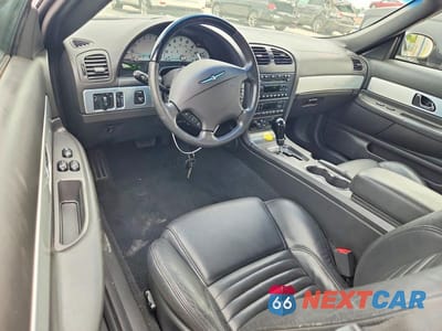 Zdjęcie 8 z 12 samochodu: 2002 FORD THUNDERBIRD VIN:1FAHP60A12Y124816 - miniatura