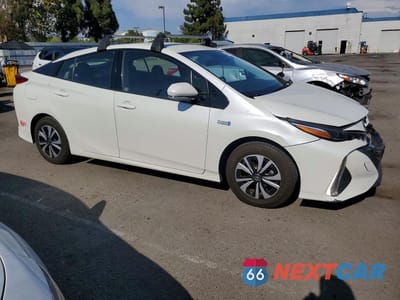 Czwarte zdjęcie samochodu z boku: 2017 TOYOTA PRIUS PRIME PREMIUM VIN:JTDKARFP4H3008157 - miniatura