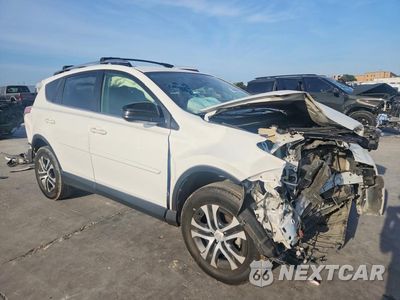 Czwarte zdjęcie samochodu z boku: 2018 TOYOTA RAV4 LE VIN:JTMZFREV0JJ180669 - miniatura