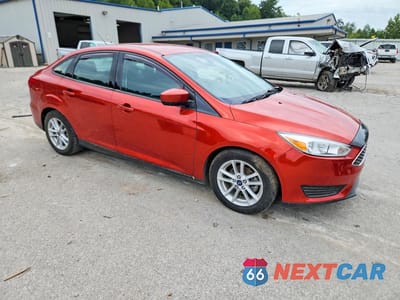 Czwarte zdjęcie samochodu z boku: 2018 FORD FOCUS SE VIN:1FADP3F29JL286234 - miniatura