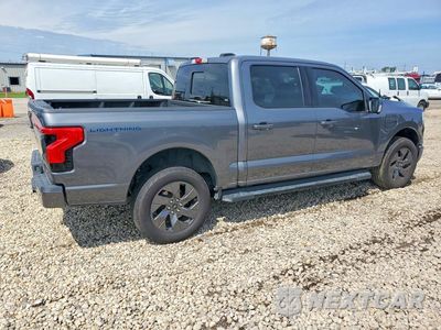 Trzecie zdjęcie samochodu z tyłu: 2022 FORD F150 LIGHTNING PRO VIN:1FT6W1EV7NWG03440 - miniatura