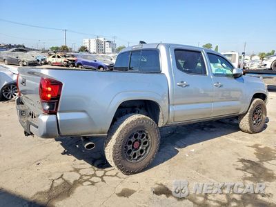 Trzecie zdjęcie samochodu z tyłu: 2022 TOYOTA TACOMA SR V6 VIN:3TMCZ5AN0NM499431 - miniatura